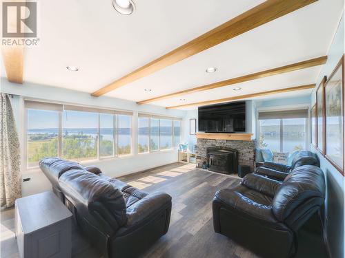 3920 Trout Drive, Lac La Hache, BC - Indoor Photo Showing Living Room With Fireplace