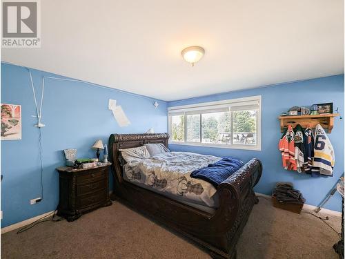 3920 Trout Drive, Lac La Hache, BC - Indoor Photo Showing Bedroom