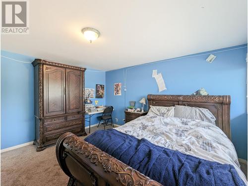 3920 Trout Drive, Lac La Hache, BC - Indoor Photo Showing Bedroom