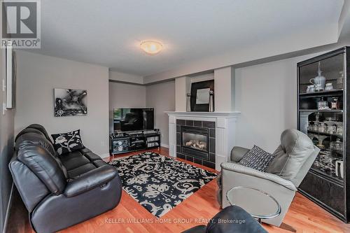 95 Halls Dr, Centre Wellington, ON - Indoor Photo Showing Living Room With Fireplace