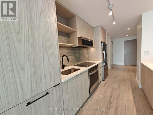 #710 -185 Dunlop St E, Barrie, ON - Indoor Photo Showing Kitchen With Upgraded Kitchen