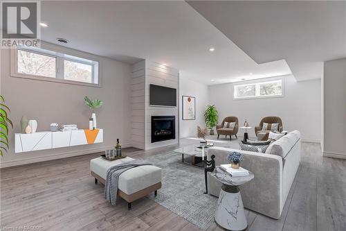 Virtually Staged - 80 Loucks Lane, Chatsworth, ON - Indoor Photo Showing Living Room With Fireplace