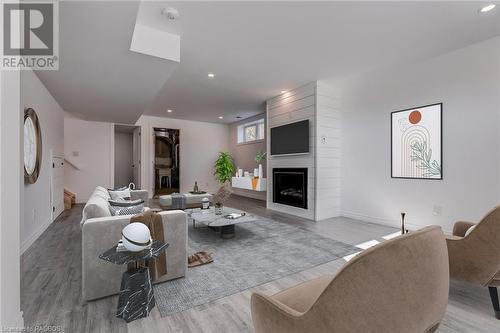 Virtually Staged - 80 Loucks Lane, Chatsworth, ON - Indoor Photo Showing Living Room With Fireplace