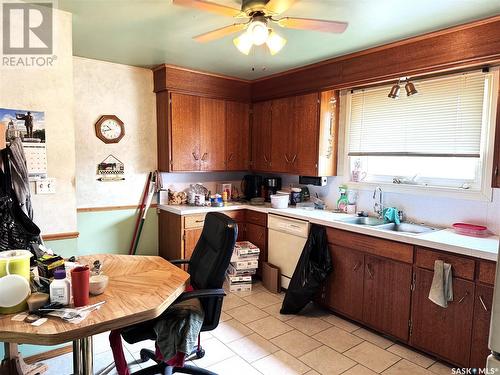 12 Munster Street, Lanigan, SK - Indoor Photo Showing Kitchen With Double Sink