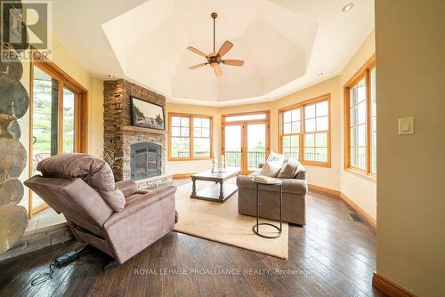 10380 Highway 41  N, Addington Highlands, ON - Indoor Photo Showing Living Room With Fireplace