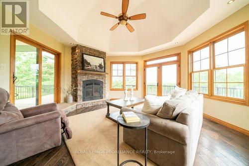 10380 Highway 41  N, Addington Highlands, ON - Indoor Photo Showing Living Room With Fireplace