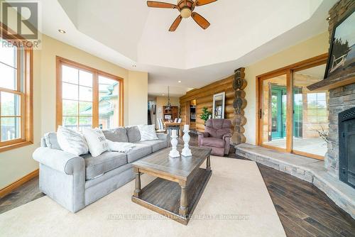 10380 Highway 41  N, Addington Highlands, ON - Indoor Photo Showing Living Room With Fireplace