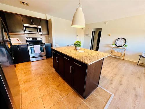 606 565 Corydon Avenue, Winnipeg, MB - Indoor Photo Showing Kitchen With Stainless Steel Kitchen