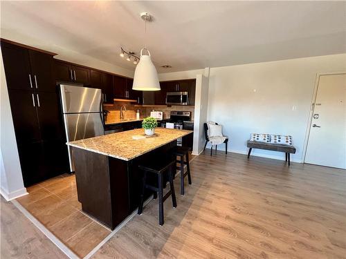 606 565 Corydon Avenue, Winnipeg, MB - Indoor Photo Showing Kitchen With Stainless Steel Kitchen