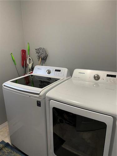 103165 54N Road, Brandon, MB - Indoor Photo Showing Laundry Room