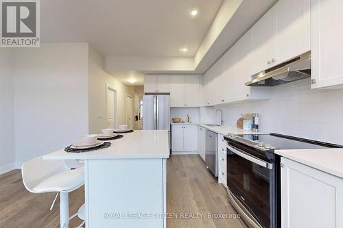 #249 -9590 Islington Ave, Vaughan, ON - Indoor Photo Showing Kitchen With Upgraded Kitchen
