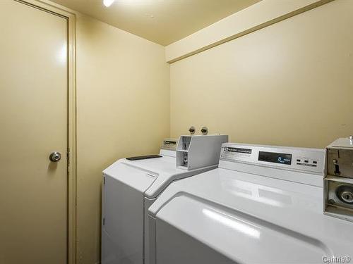 Salle de lavage - 303-280 Boul. Cartier O., Laval (Laval-Des-Rapides), QC - Indoor Photo Showing Laundry Room