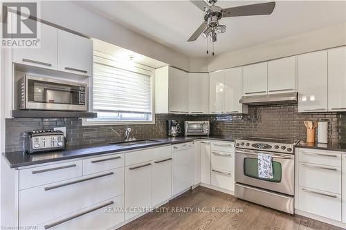 #12 -214 South St W, Aylmer, ON - Indoor Photo Showing Kitchen With Double Sink