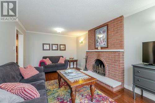 2706 Ambercroft Tr, Mississauga, ON - Indoor Photo Showing Living Room With Fireplace