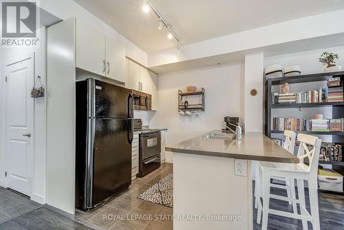 #805 -85 Robinson St, Hamilton, ON - Indoor Photo Showing Kitchen With Double Sink