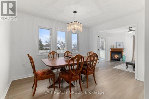 32 Heritage Drive, Prince Edward County, ON - Indoor Photo Showing Dining Room With Fireplace