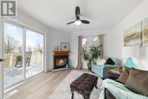 32 Heritage Drive, Prince Edward County, ON - Indoor Photo Showing Living Room With Fireplace