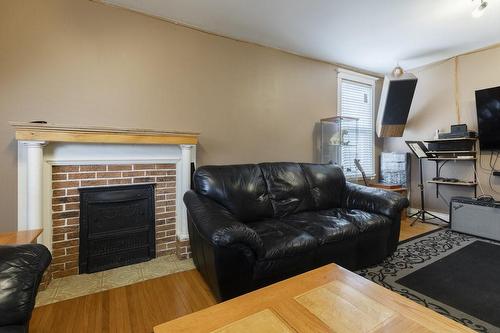 29 Sunset Avenue, Hamilton, ON - Indoor Photo Showing Living Room With Fireplace