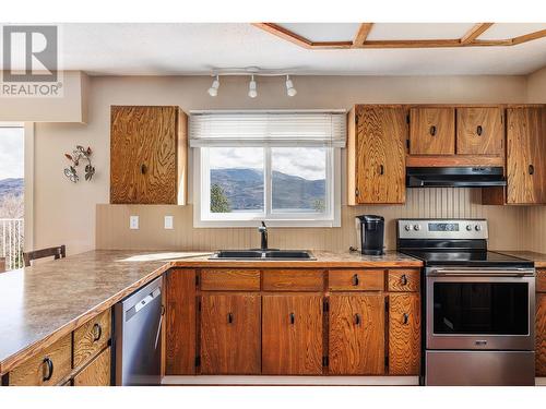 6335 Topham Place, Peachland, BC - Indoor Photo Showing Kitchen With Stainless Steel Kitchen With Double Sink