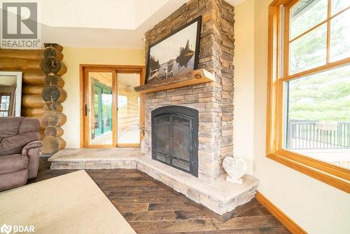 10380 Highway 41, Kaladar, ON - Indoor Photo Showing Living Room With Fireplace