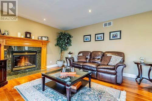 71 Stella St, Pelham, ON - Indoor Photo Showing Living Room With Fireplace