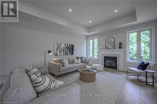 17 Spruce Cres, North Middlesex, ON - Indoor Photo Showing Living Room With Fireplace