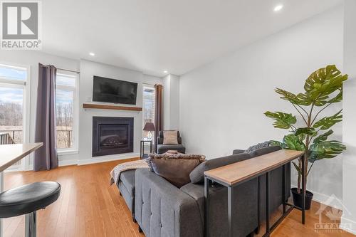 653 Putney Crescent, Ottawa, ON - Indoor Photo Showing Living Room With Fireplace