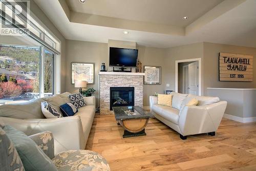 13117 Porter Drive, Lake Country, BC - Indoor Photo Showing Living Room With Fireplace
