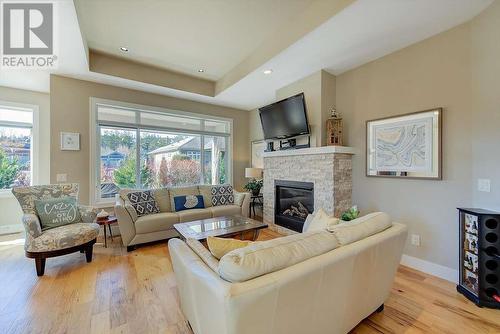 13117 Porter Drive, Lake Country, BC - Indoor Photo Showing Living Room With Fireplace