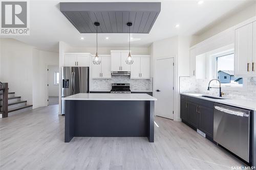 710 Bentley Manor, Saskatoon, SK - Indoor Photo Showing Kitchen With Stainless Steel Kitchen With Upgraded Kitchen