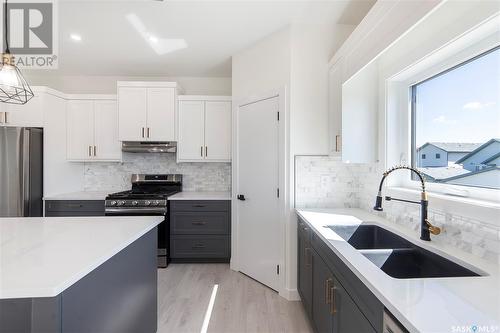 710 Bentley Manor, Saskatoon, SK - Indoor Photo Showing Kitchen With Double Sink With Upgraded Kitchen