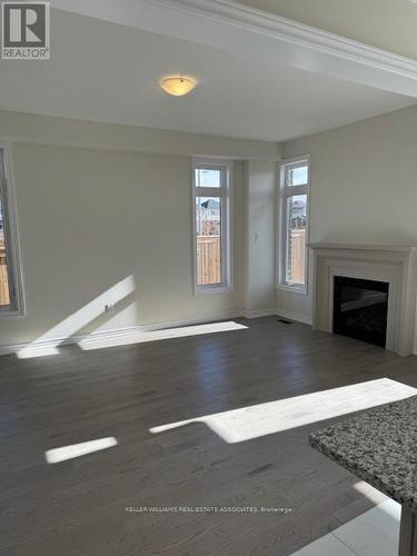 21 Molnar Cres, Brantford, ON - Indoor Photo Showing Other Room With Fireplace