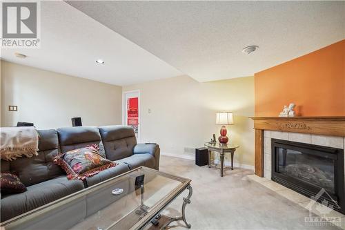 562 Wild Shore Crescent, Ottawa, ON - Indoor Photo Showing Living Room With Fireplace