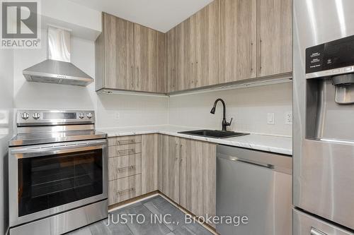 205 - 25 Trailwood Drive, Mississauga, ON - Indoor Photo Showing Kitchen With Stainless Steel Kitchen