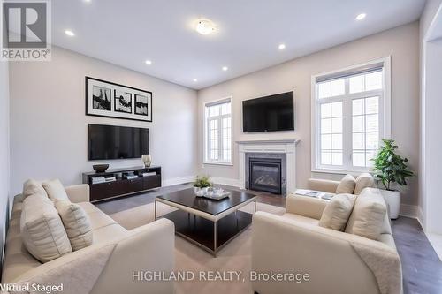 425 Threshing Mill Blvd, Oakville, ON - Indoor Photo Showing Living Room With Fireplace