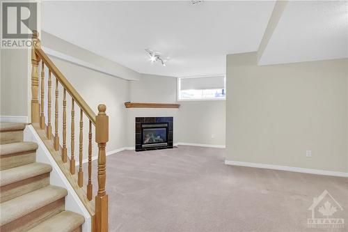 9 Plumas Gate, Nepean, ON - Indoor With Fireplace