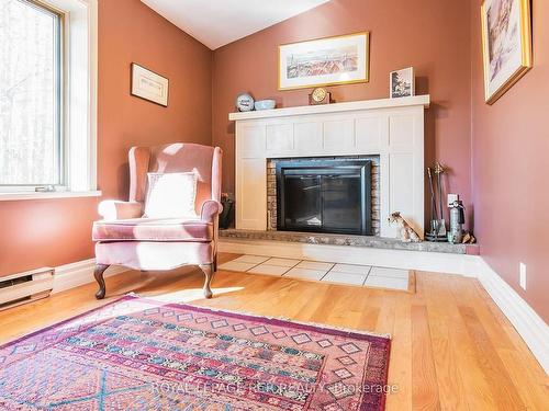 1380 Queen St W, Caledon, ON - Indoor Photo Showing Living Room With Fireplace