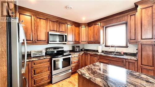 1131 Route 134, Petit-Rocher-Sud, NB - Indoor Photo Showing Kitchen With Double Sink