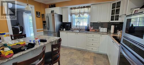 13 Johnny Jims Road, Jacques Fontaine, NL - Indoor Photo Showing Kitchen With Stainless Steel Kitchen
