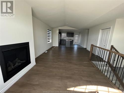 390 Hemlock Lane Unit# Upper, Lakeshore, ON - Indoor Photo Showing Living Room With Fireplace
