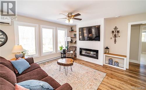 17 Hubbard Street, Burton, NB - Indoor Photo Showing Living Room With Fireplace