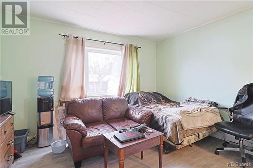 33 Queen Street, Minto, NB - Indoor Photo Showing Bedroom