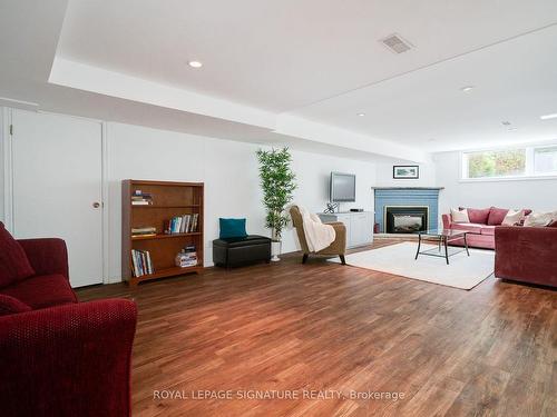 16 Palomino Cres, Toronto, ON - Indoor Photo Showing Living Room With Fireplace