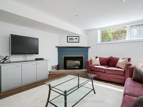 16 Palomino Cres, Toronto, ON - Indoor Photo Showing Living Room With Fireplace
