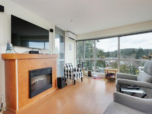 627-2745 Veterans Memorial Pkwy, Langford, BC - Indoor Photo Showing Living Room With Fireplace