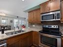 120-850 Saucier Avenue, Kelowna, BC  - Indoor Photo Showing Kitchen With Double Sink 