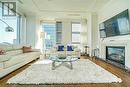 #3903 -183 Wellington St W, Toronto, ON  - Indoor Photo Showing Living Room With Fireplace 
