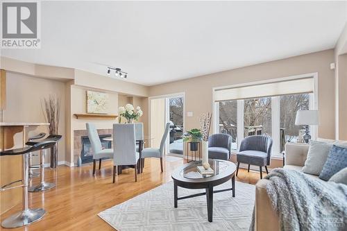The open concept main living space is adorned with a natural gas furnace, abundant light, a patio door that leads to the back deck is a perfect spot for your morning coffee. - 138 Parkrose Private, Ottawa, ON - Indoor Photo Showing Living Room