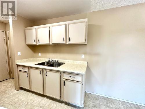 8909 92Nd Avenue Unit# 306, Osoyoos, BC - Indoor Photo Showing Kitchen With Double Sink