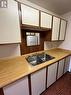 195 Chamberlain Crescent Unit# 108, Tumbler Ridge, BC  - Indoor Photo Showing Kitchen With Double Sink 